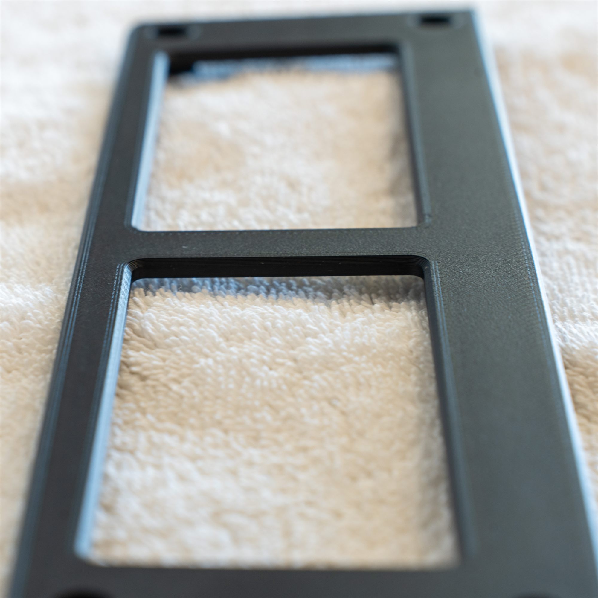 Close-up of the smooth finish on a Fiero aux gauge cover
