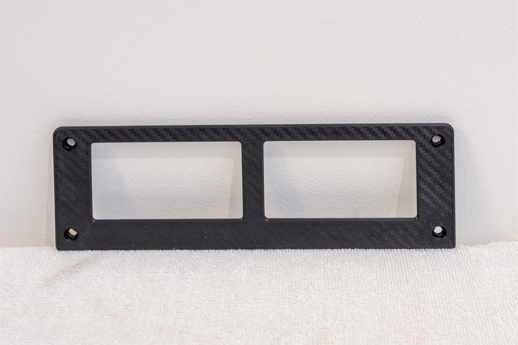 Reproduction Fiero aux gauge cover with two gauge windows, in the carbon weave finish