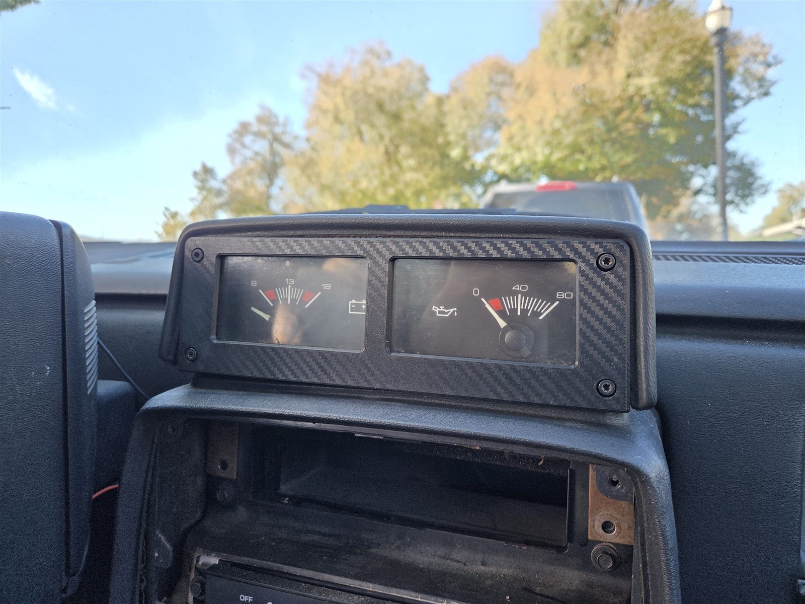 Reproduction Fiero aux gauge cover installed in the console gauge pod