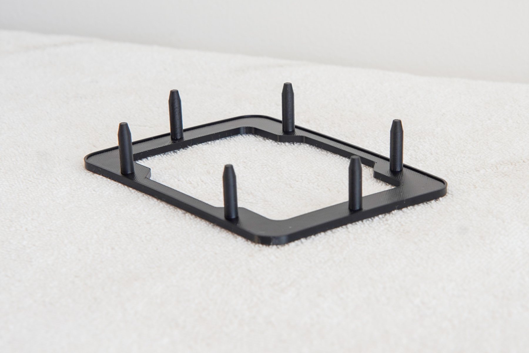 3D printed Fiero shifter boot plate test print in black